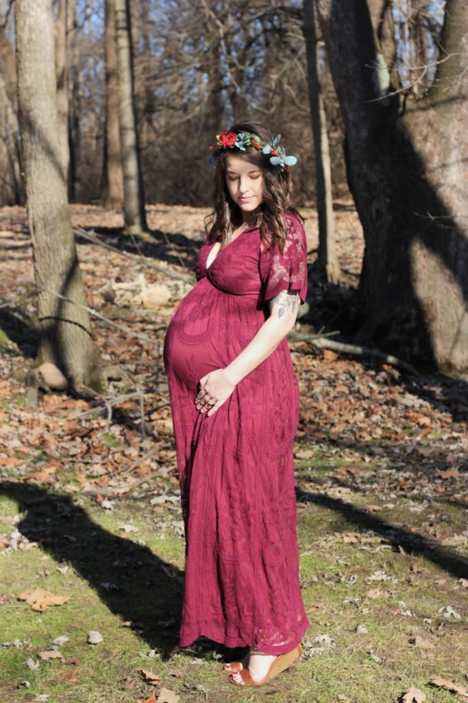 Alicia 30 weeks pregnant wearing flower crown